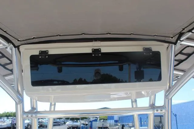 Slide: The Image of 2023 Sea Chaser 21 LX boat seat and storage compartment. - 30