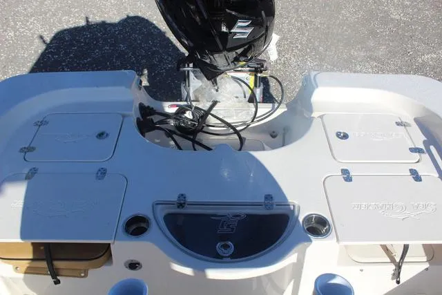 Slide: The Image of Open storage compartment on a 2023 Sea Chaser 21 LX boat. - 34