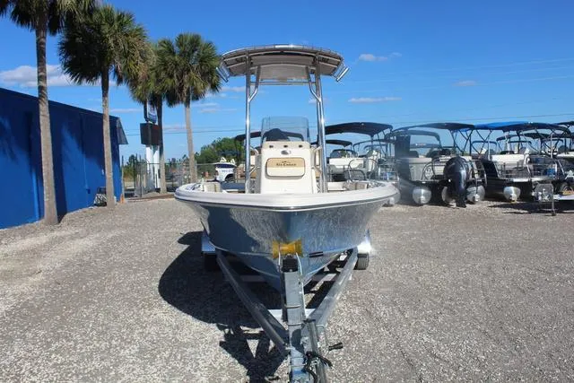 Slide: The Image of 2023 Sea Chaser 21 LX boat on a trailer in a marina. - 7