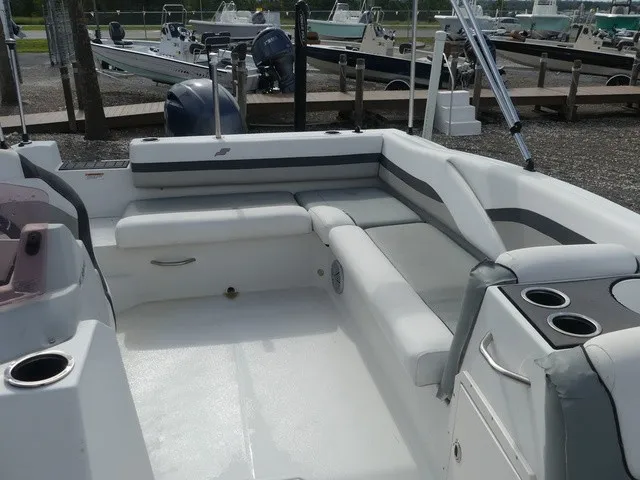 Slide: The Image of 2021 Starcraft SVX 191 OB with spacious cushioned seating area and outdoor cup holders. - 18