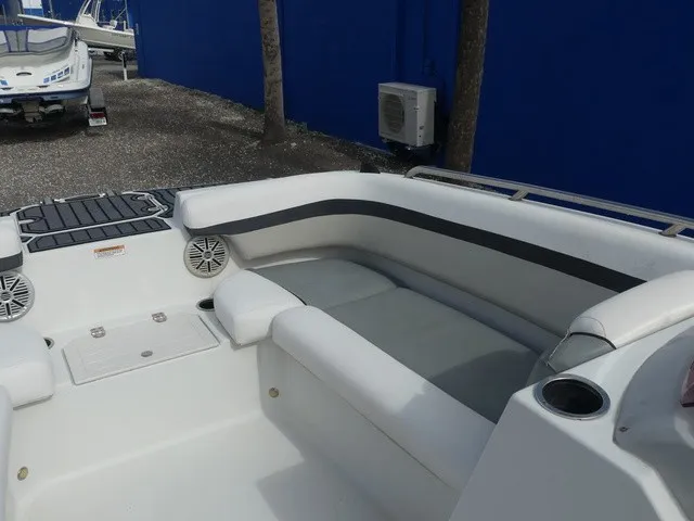 Slide: The Image of The image shows the cockpit of a 2021 Starcraft SVX 191 OB with white upholstery. - 14