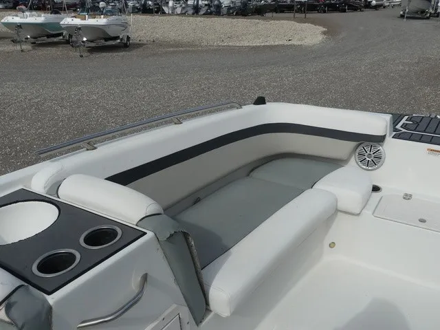 Slide: The Image of The image shows the cockpit of a 2021 Starcraft SVX 191 OB with white upholstery. - 15