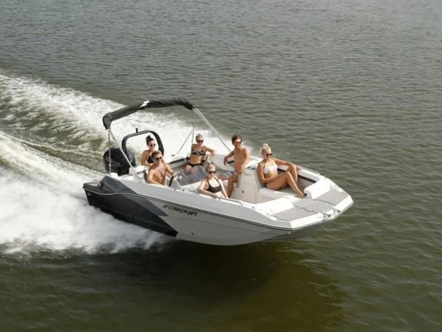 The Image of A 2021 Starcraft SVX 191 OB on the water with several people on board. - 1