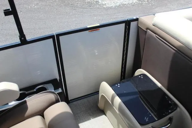 Slide: The Image of Close-up of Yamaha logo on a 2023 Godfrey AquaPatio 255 SBC boat. - 8