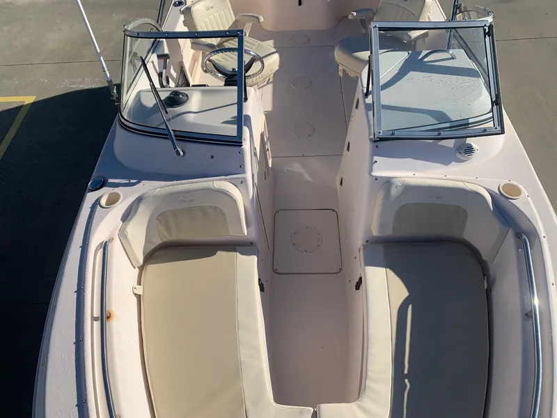 Slide: The Image of 2009 Grady-White Tournament 205 boat interior with seating and windshield. - 13