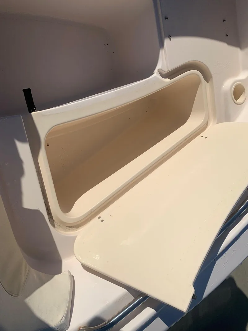 Slide: The Image of Storage compartment of a 2009 Grady-White Tournament 205 boat. - 15