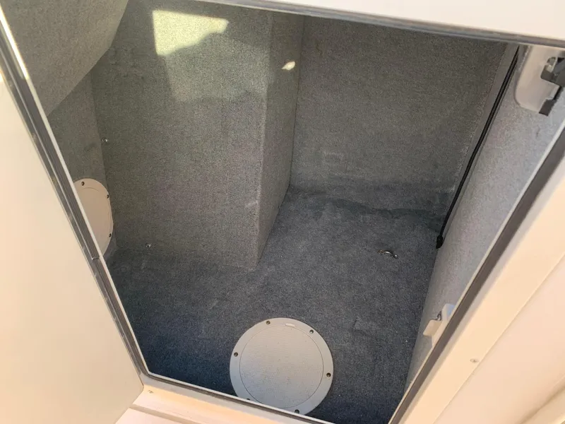 Slide: The Image of Interior storage compartment of 2009 Grady-White Tournament 205 boat. - 16