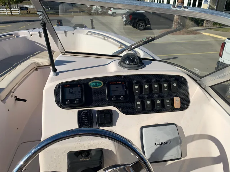 Slide: The Image of 2009 Grady-White Tournament 205 boat dashboard with Garmin navigation system. - 19