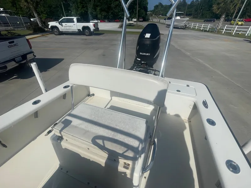 Slide: The Image of 2006 Intruder Pro Marine 20 boat with Suzuki outboard motor in parking lot. - 11