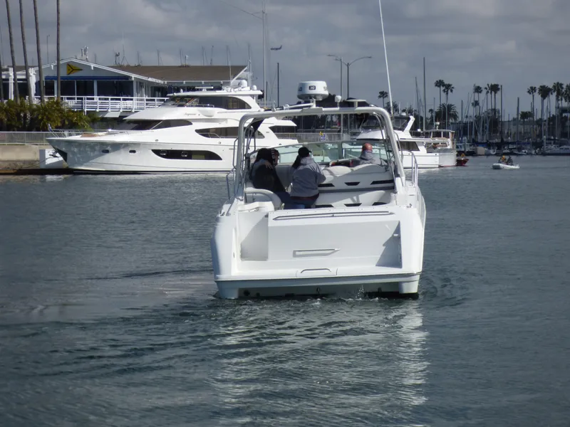 Slide: The Image of 2004 Formula 31 Performance Cruiser in harbor, surrounded by yachts. - 1