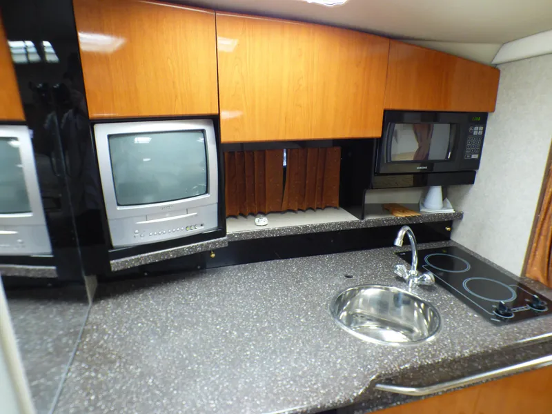 Slide: The Image of Galley in a 2004 Formula 31 Performance Cruiser yacht. - 19