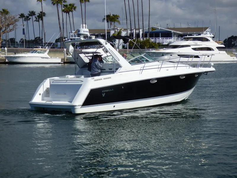 Slide: The Image of 2004 Formula 31 Performance Cruiser on calm waters. - 2