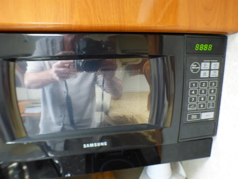 Slide: The Image of Samsung microwave in a 2004 Formula 31 Performance Cruiser. - 20