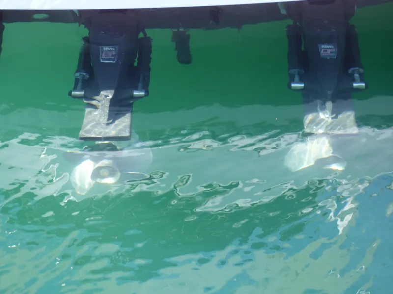 Slide: The Image of Twin propellers of a 2004 Formula 31 Performance Cruiser in water. - 25