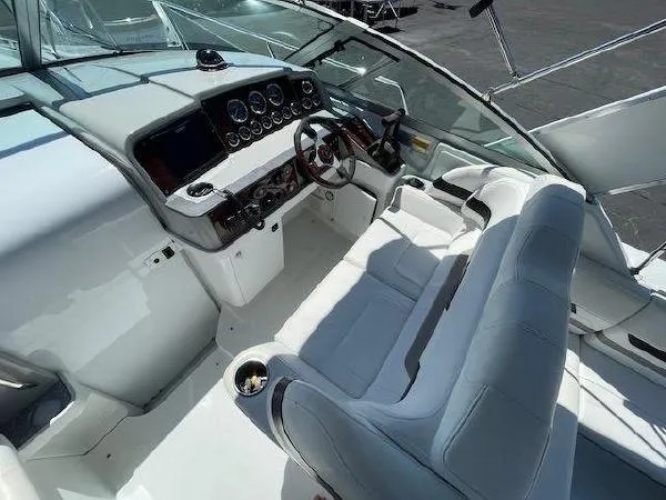 Slide: The Image of Interior of a 2004 Formula 31 Performance Cruiser with helm station. - 8