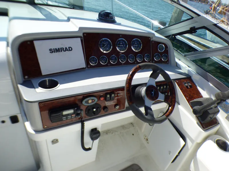 Slide: The Image of Dashboard of a 2004 Formula 31 Performance Cruiser with Simrad system. - 9