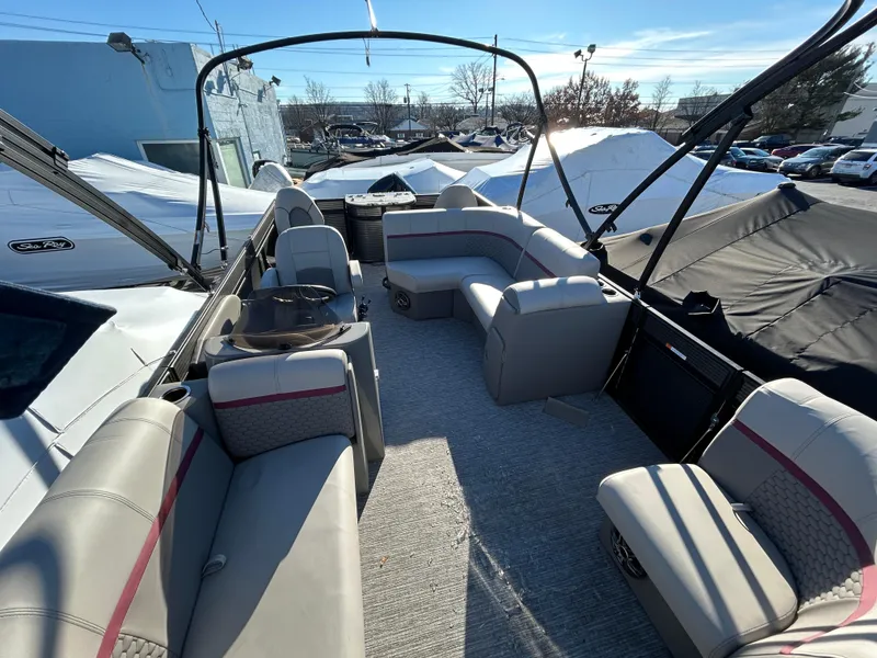 Slide: The Image of 2023 Qwest 818 XRE Cruise boat interior with spacious seating and modern design. - 4