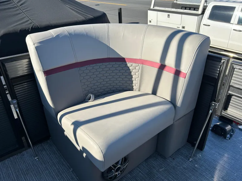 Slide: The Image of 2023 Qwest 818 XRE Cruise boat seat with gray and red upholstery. - 7