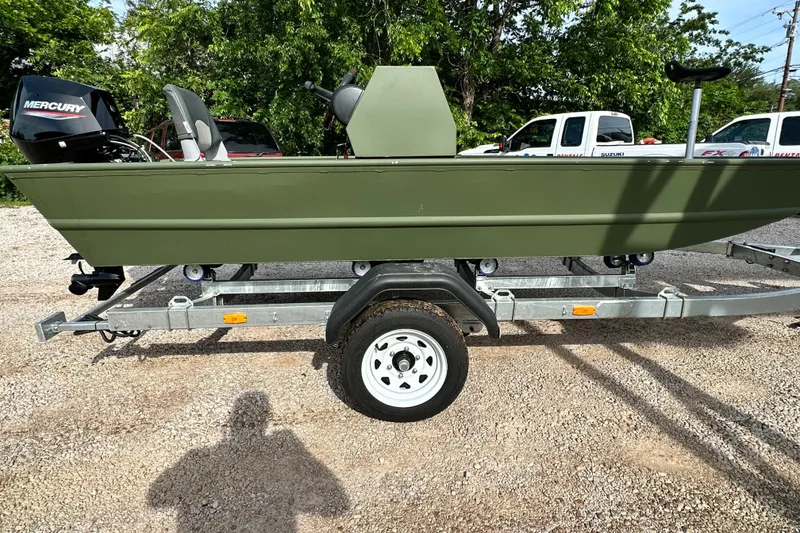 Slide: The Image of 2022 Jon Boat Aluminum Boat on trailer with Mercury outboard motor. - 3
