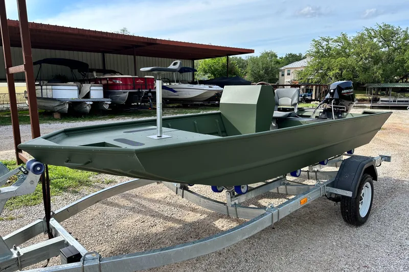 Slide: The Image of 2022 Jon Boat Aluminum Boat on trailer in outdoor storage area. - 4