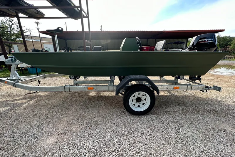 Slide: The Image of 2022 Jon Boat Aluminum Boat on trailer with Mercury outboard motor. - 5