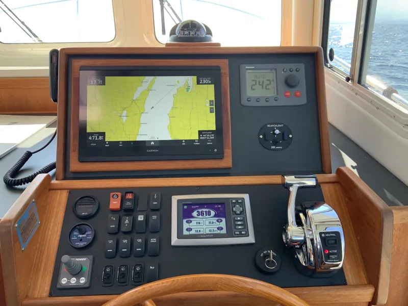 Slide: The Image of Helm of 2010 Nordic Tug 32 with navigation and control systems. - 16