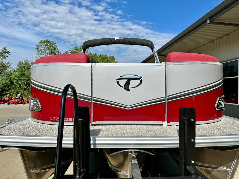 Slide: The Image of 2023 Tahoe Pontoon LTZ QUAD Lounger 23 FT Triple 25 SP, red and white, docked. - 1