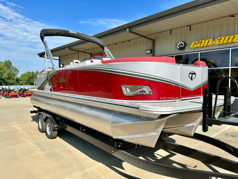 Slide: The Image of 2023 Tahoe Pontoon LTZ QUAD Lounger 23 FT Triple 25 SP in red and silver. - 2