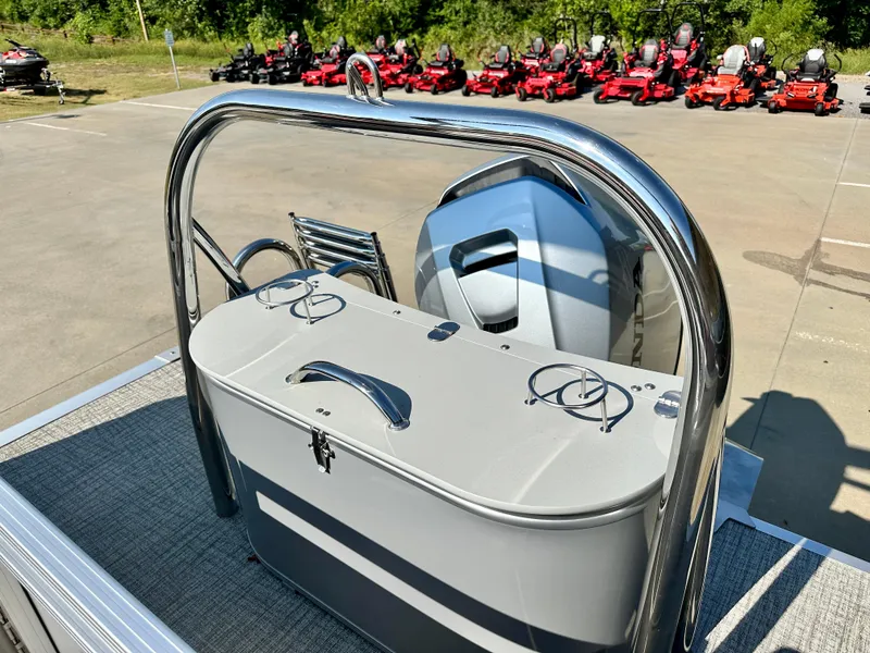 Slide: The Image of 2023 Tahoe Pontoon LTZ QUAD Lounger 23 FT Triple 25 SP rear view with motor and storage. - 8