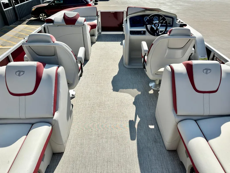 Slide: The Image of 2023 Tahoe Pontoon LTZ QUAD Lounger 23 FT Triple 25 SP interior with luxurious seating. - 9