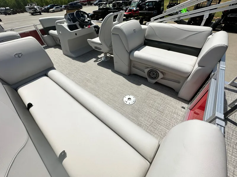 Slide: The Image of 2023 Tahoe Pontoon SLT 1980 GL interior with plush seating and modern helm. - 15