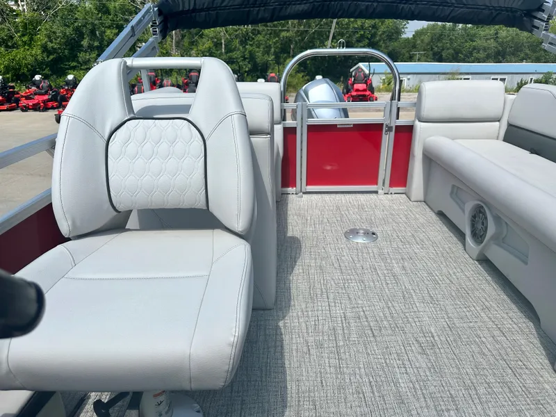 Slide: The Image of 2023 Tahoe Pontoon SLT 1980 GL interior with white seating and red accents. - 7