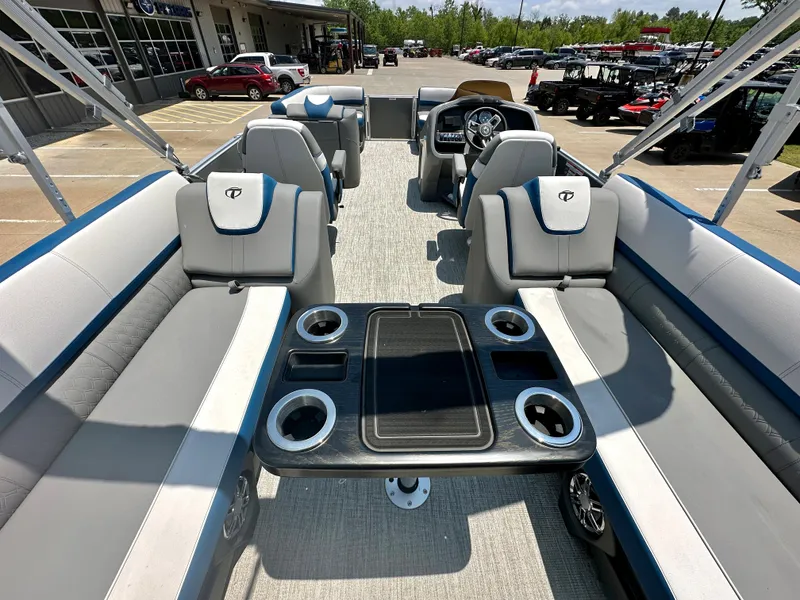 Slide: The Image of 2023 Tahoe Pontoon Cascade Cruise 25 FT Triple 25 WG interior with seating and table. - 10