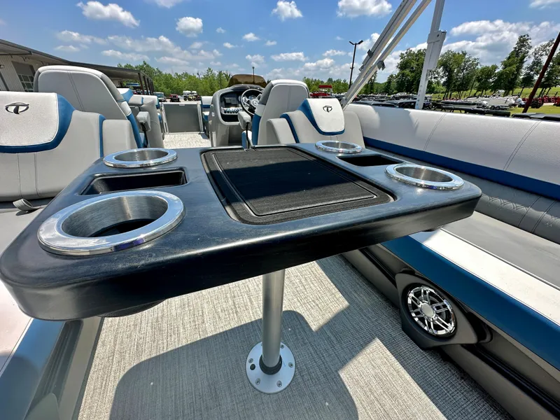 Slide: The Image of 2023 Tahoe Pontoon Cascade Cruise 25 FT Triple 25 WG interior with cup holders and seating. - 11