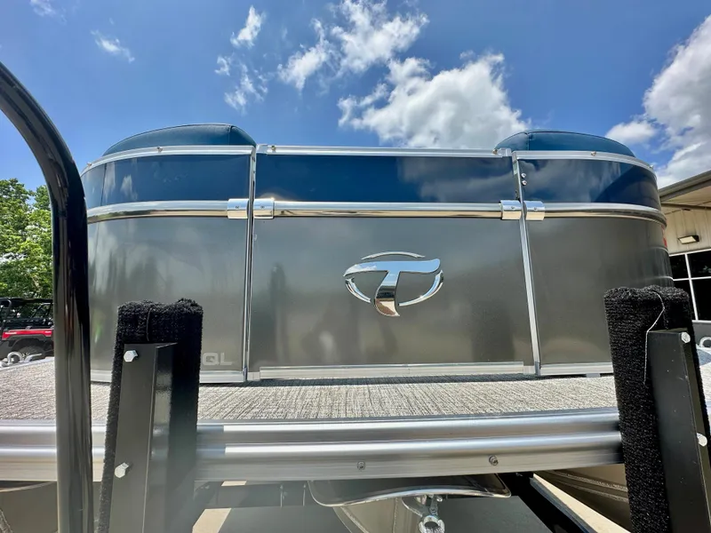 Slide: The Image of 2023 Tahoe Pontoon Cascade Cruise 25 FT Triple 25 WG under a blue sky. - 4