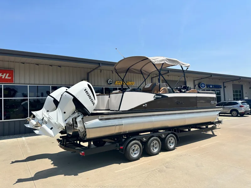 Slide: The Image of 2023 Tahoe Pontoon Cascade Cruise 25 FT Triple 27 WG on trailer outside dealership. - 1
