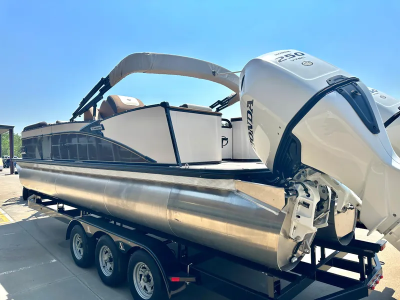 Slide: The Image of 2023 Tahoe Pontoon Cascade Cruise 25 FT Triple 27 WG on trailer with Honda 250 engine. - 10