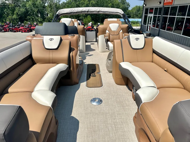 Slide: The Image of 2023 Tahoe Pontoon Cascade Cruise 25 FT Triple 27 WG interior with tan and white seating. - 12