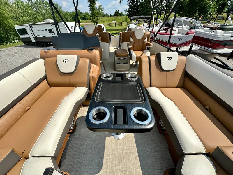 Slide: The Image of 2023 Tahoe Pontoon Cascade Cruise 25 FT Triple 27 WG interior with seating and table. - 17