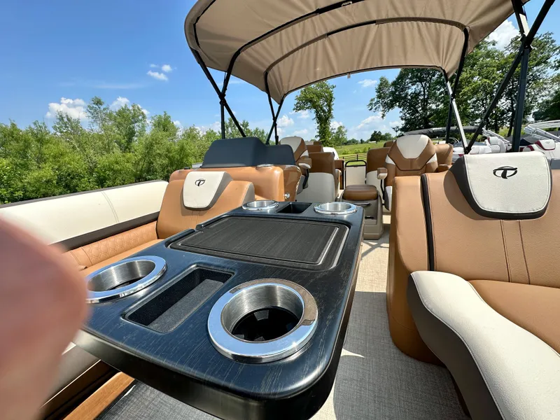 Slide: The Image of 2023 Tahoe Pontoon Cascade Cruise 25 FT Triple 27 WG interior with seating and table. - 18