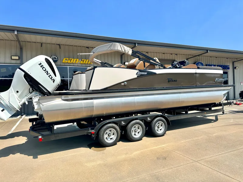 Slide: The Image of 2023 Tahoe Pontoon Cascade Cruise 25 FT Triple 27 WG on trailer with Honda outboard motor. - 7