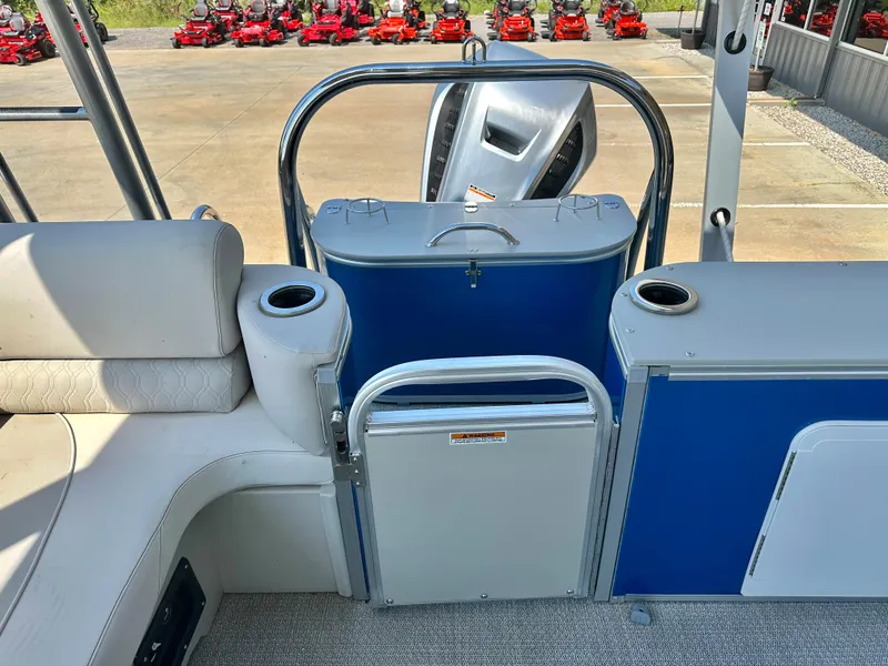 Slide: The Image of 2023 Tahoe Pontoon Cascade Cruise ENT 25 FT Triple 25 WG interior with seating and storage. - 10