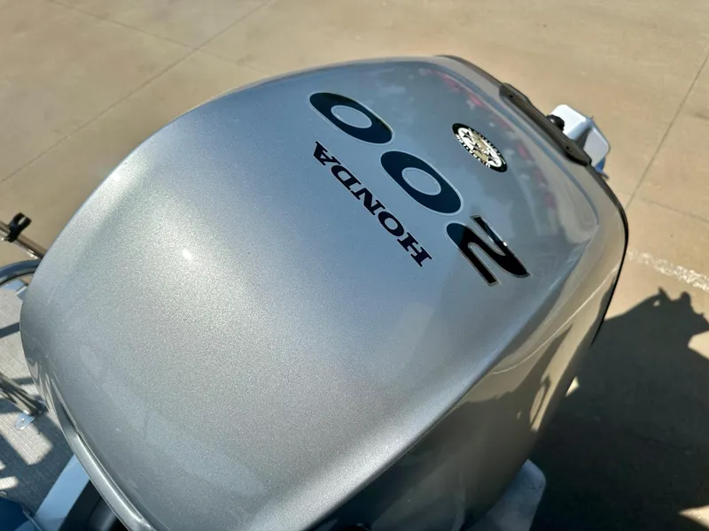Slide: The Image of Honda 200 outboard motor on 2023 Tahoe Pontoon Cascade Cruise ENT 25 FT Triple 25 WG. - 11