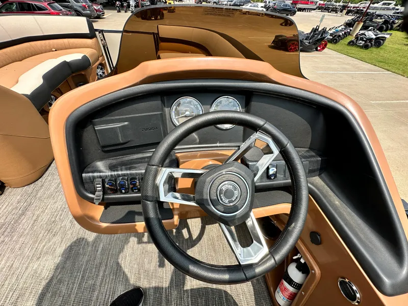 Slide: The Image of 2023 Tahoe Pontoon Cascade Elite 23 FT dashboard and steering wheel. - 10