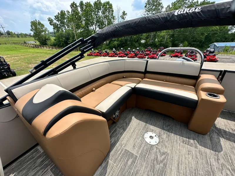 Slide: The Image of 2023 Tahoe Pontoon Cascade Elite 23 FT interior with tan and black seating. - 11