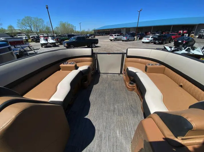 Slide: The Image of 2023 Tahoe Pontoon Cascade Elite 23 FT interior with tan and white seating. - 5
