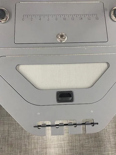 Slide: The Image of 2024 South Bay S222FCR3 boat dashboard with measurement markings and control panel. - 10