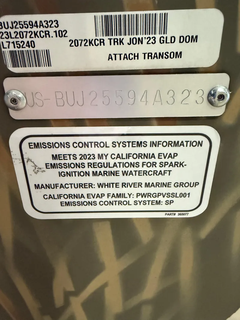 Slide: The Image of 2023 Tracker Grizzly 2072 CC Sportsman emissions control information label on marine watercraft. - 14