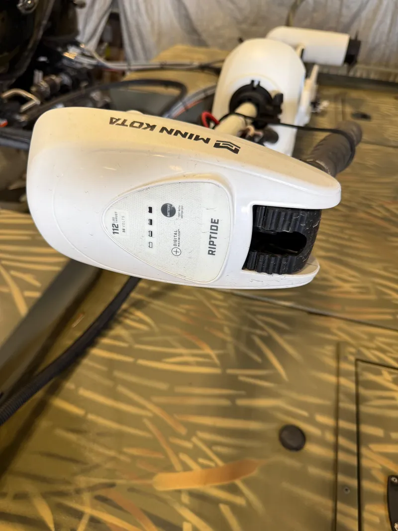 Slide: The Image of Minn Kota Riptide motor on 2023 Tracker Grizzly 2072 CC Sportsman boat. - 8