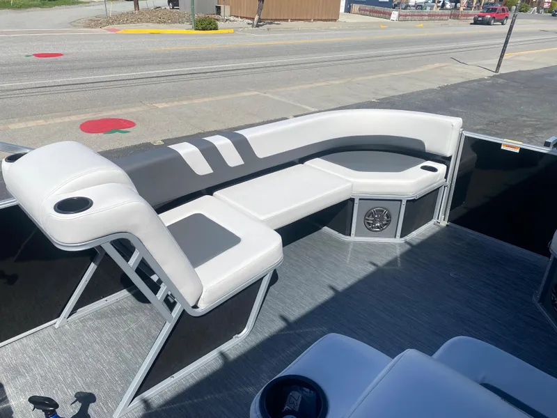 Slide: The Image of 2023 Godfrey MIGHTY G 1476C boat interior with white and gray seating. - 5